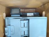 a box that has a printer and a printer on top of it