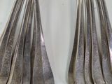 a lot of spoons that are sitting on a table
