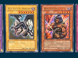 four different cards of different colors and designs on a blue background