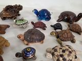 a lot of small figurines that are on the table