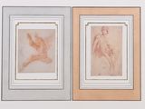 two framed drawings of a woman and a bird on a wall