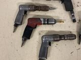 a lot of tools that are sitting on a table