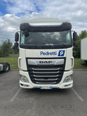a picture of a white truck parked in a parking lot
