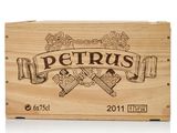 a wooden box with a sign that says petrus on it