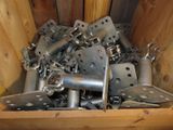 a wooden box filled with lots of different types of metal