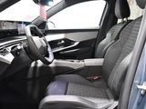 a picture of the inside of a car with a steering wheel