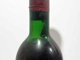 a bottle of wine that is sitting on a table