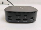 a close up of a small black device on a table