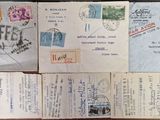 a lot of old postcards sitting on a table