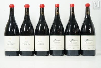 six bottles of wine are lined up on a table