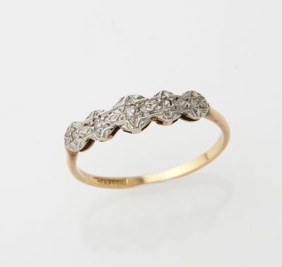 a gold and diamond ring