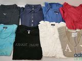 assorted men ' s polo shirts in a variety of colors