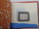 a picture of a book with a picture of a square in it