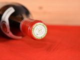 a bottle of wine that is sitting on a table