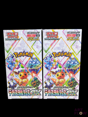 two packs of pokemon trading cards on a black background