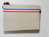 a close up of a piece of cloth with a red, white, and blue stripe on it