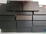 a pile of laptops sitting on top of each other
