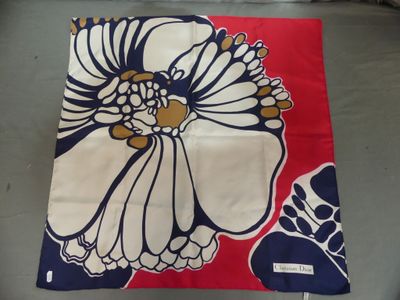 a red, white and blue flower on a red and white bandanna