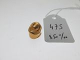 a tag with a price tag on it next to a gold bell
