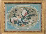 tableau représentant un oiseau et des fleurs, dans un cadre doré, sur fond bleu