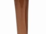 a brown glass vase sitting on a white surface