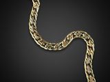 an image of a gold chain on a black background
