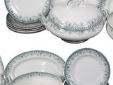 a lot of plates and bowls that are sitting on top of each other
