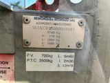 a close up of a sign on the side of a machine