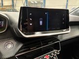 a car dashboard with a cell phone in it
