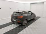 the car is parked in the garage on the checkered floor