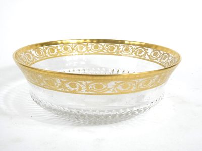 a close up of a glass bowl on a white surface