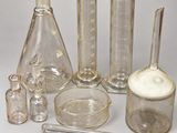 a lot of glass items that are sitting on a table