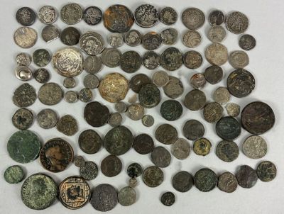a lot of coins that are on the table