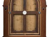 a wooden cabinet with a glass door on it