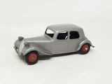 a toy car that is sitting on a white surface
