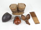 a basket, spoons, and other items that are on the table