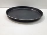 a black pan that is sitting on a table