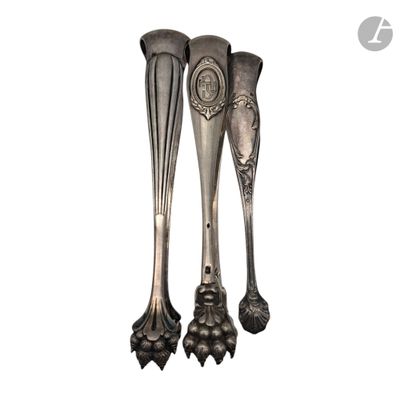 two spoons that are next to each other on a white background