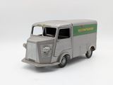 a toy truck that is sitting on a white surface