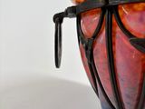 a colorful bowl that is sitting on a table
