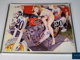 a picture of a woman sitting on a motorcycle