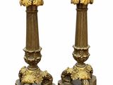 pair of antique brass candlesticks on marble bases