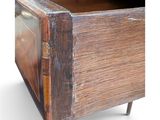 an image of a close up of a wooden drawer with a metal handle