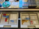 two open drawers that have a lot of items in them