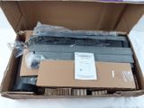 a box with a keyboard and a monitor inside of it
