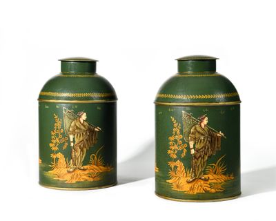 two green vases that are sitting on a white surface