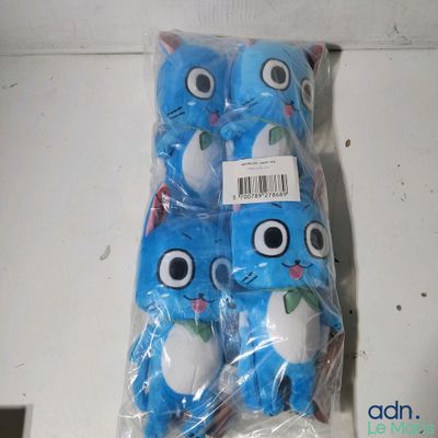 a bag of blue stuffed animals with eyes on them