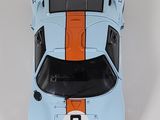 a toy car that is sitting on a white surface