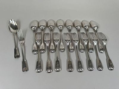 a lot of forks and spoons on the table