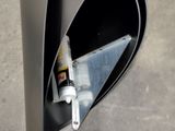 a close up of a black object on the ground